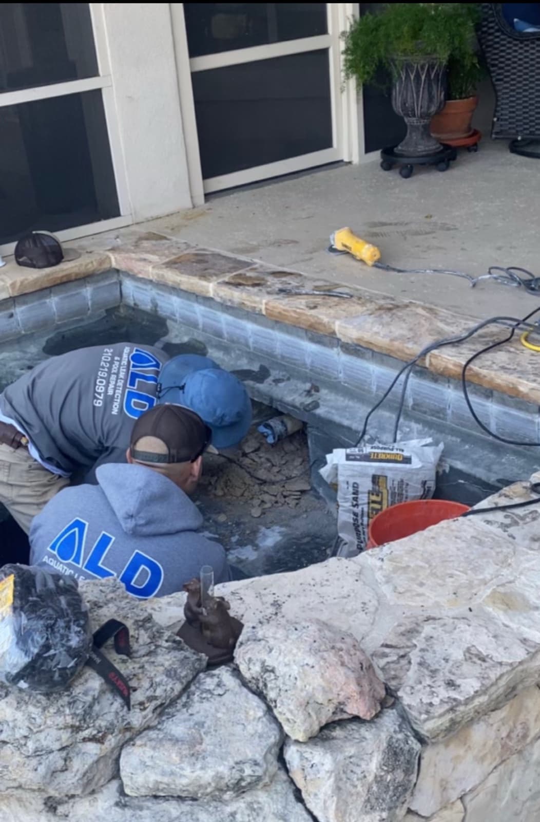 The Aquatic Leak Detection crew repairing a pool in-house