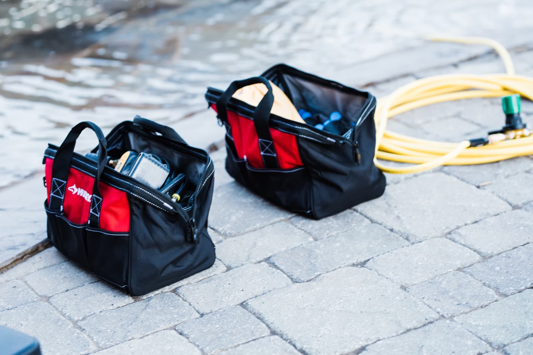 Aquatic Leak Detection field tool kits and hose staged for a pool leak job