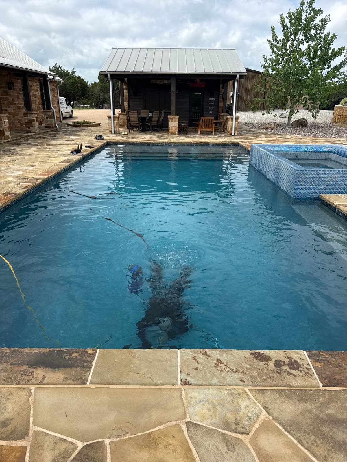 Aquatic Leak Detection technician performing an underwater pool inspection